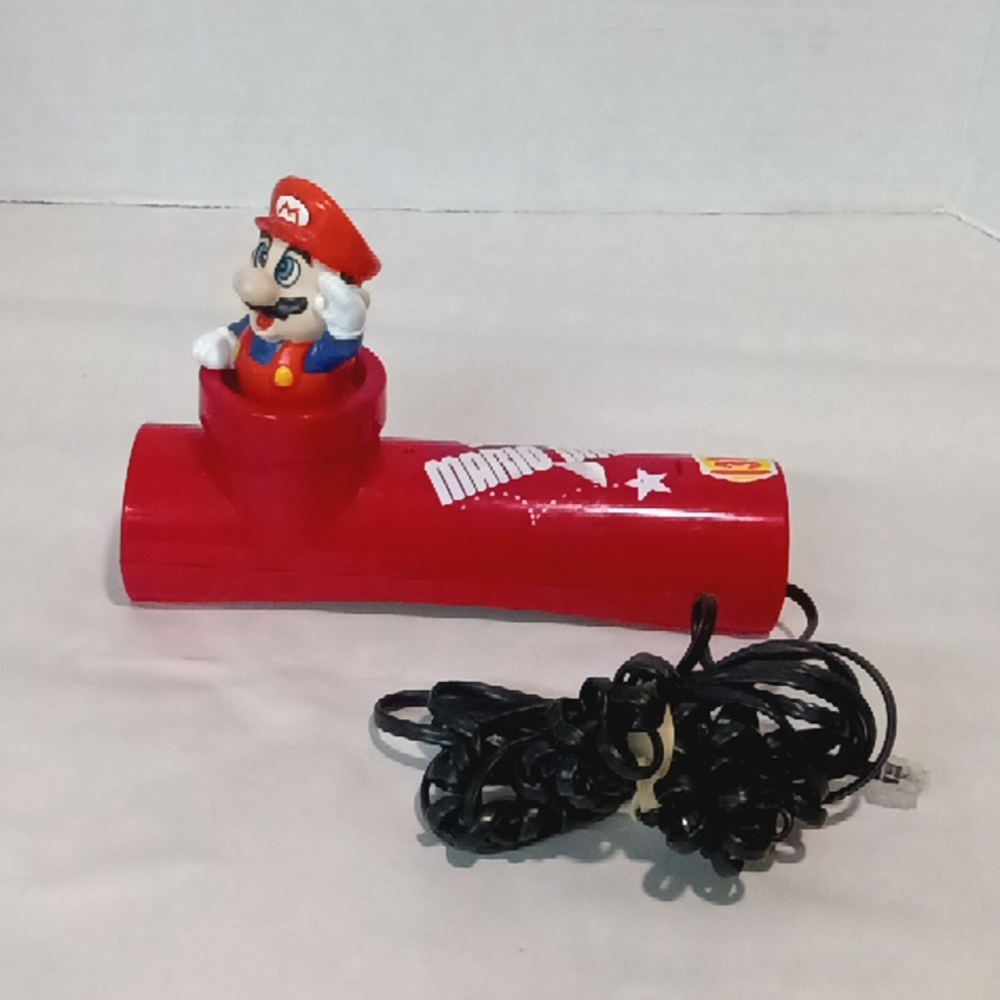1990 Nintendo red touch tone super Mario phone